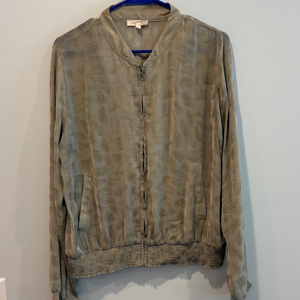 Small pin holes front and back Mystree Olive Patterned Bomber Jacket
